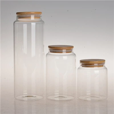 Vażett tal-ħġieġ kbir b'għatu tal-bambu